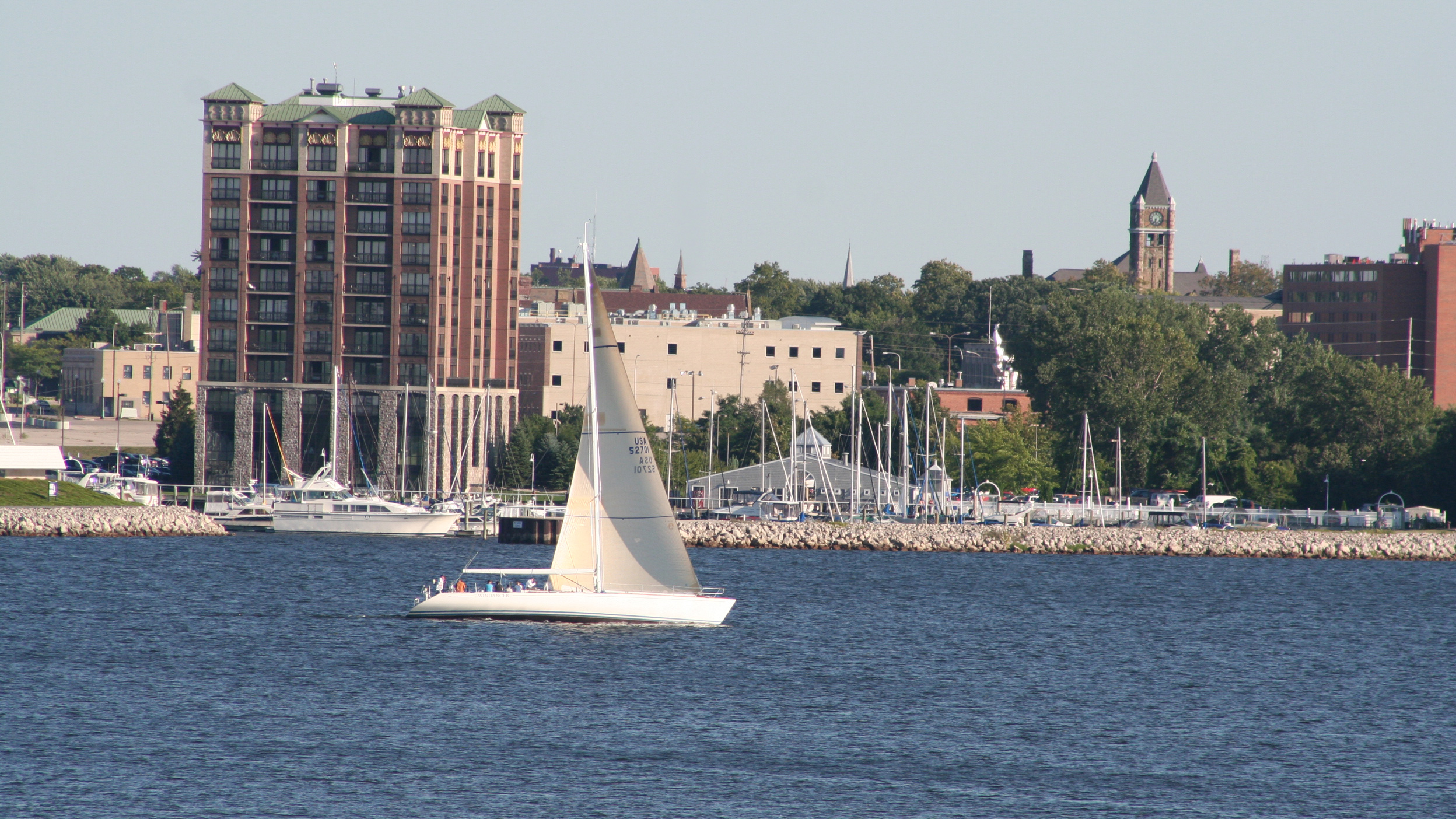 Sailboats and marina on Muskegon Lake Michigan - the waterfront condo lifestyle