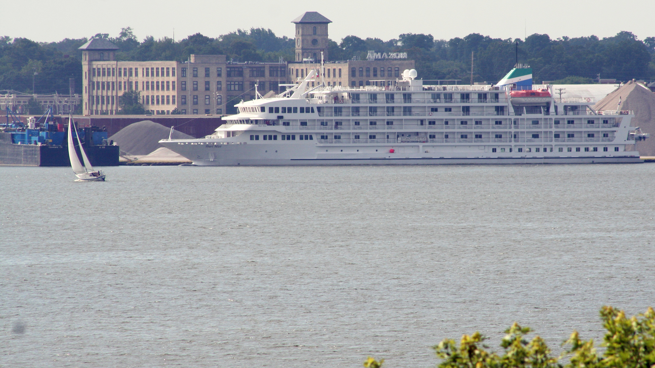 White cruise ship on Muskegon Lake visible from North Muskegon Michigan