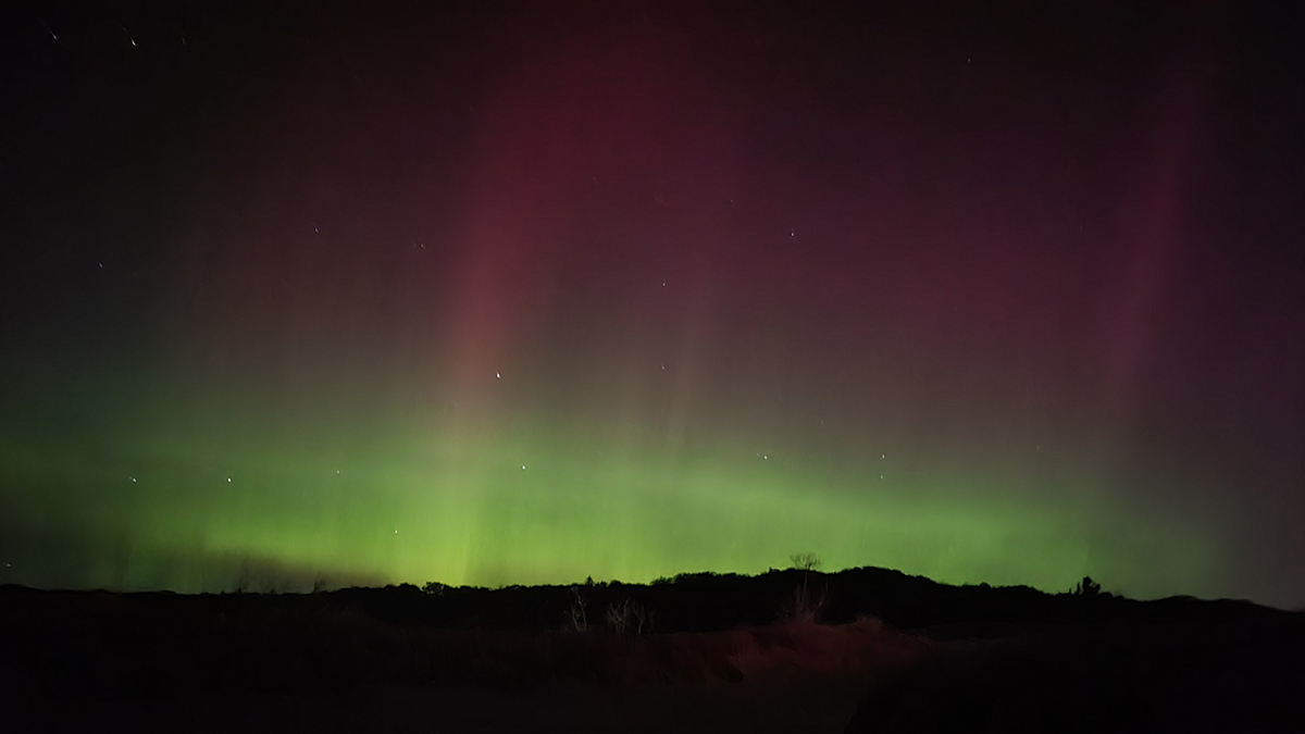 Northern lights over Muskegon Lake Michigan viewed from North Muskegon