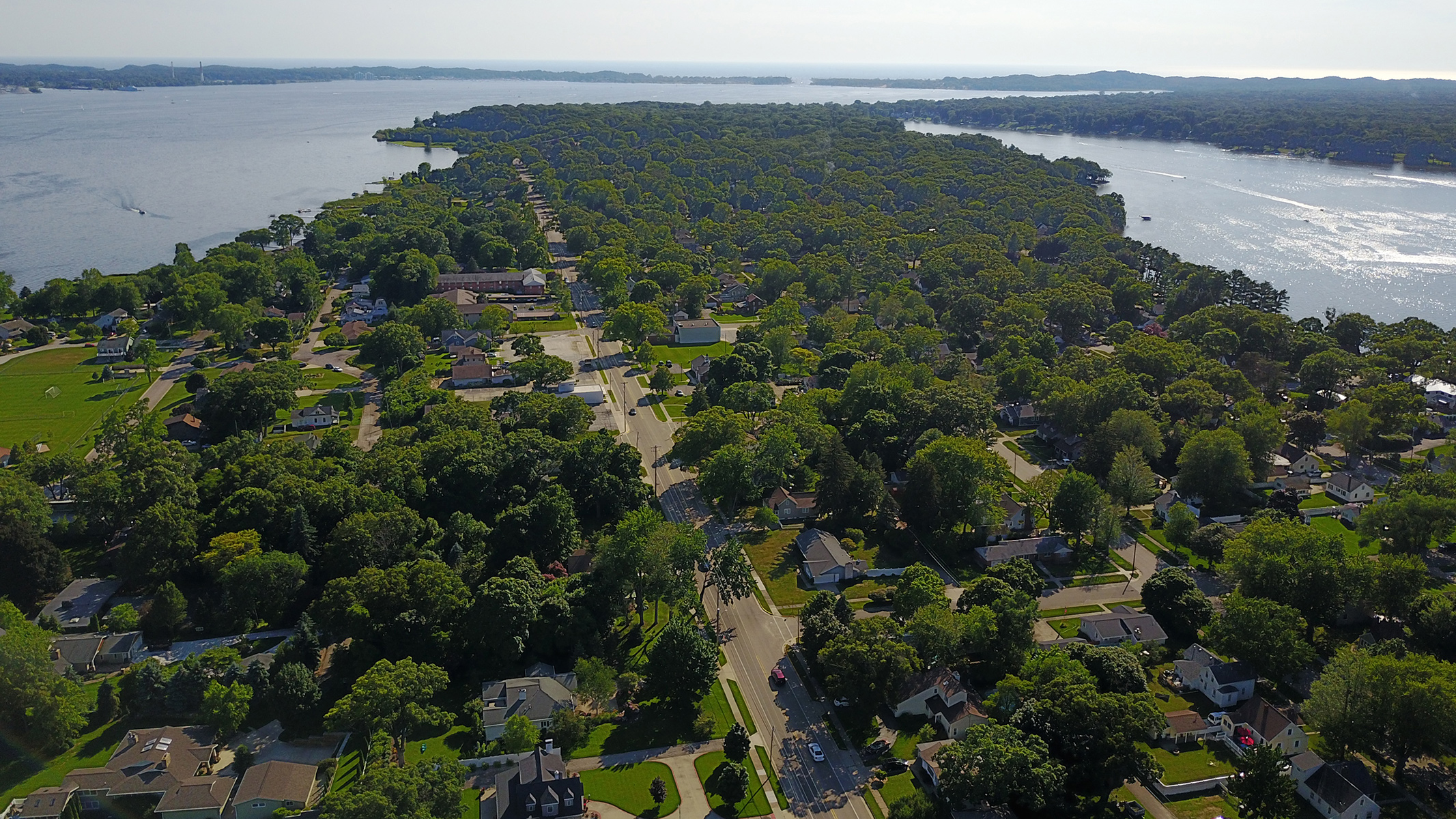 Elevated view from North Muskegon showing Bear Lake and Muskegon Lake Michigan